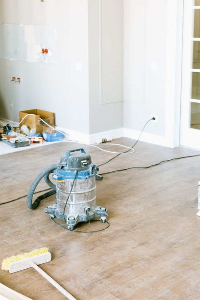 The Art of Drawing Readers In: Your attractive post title goes here Vacuum and tools in a room undergoing renovation, showcasing home improvement.